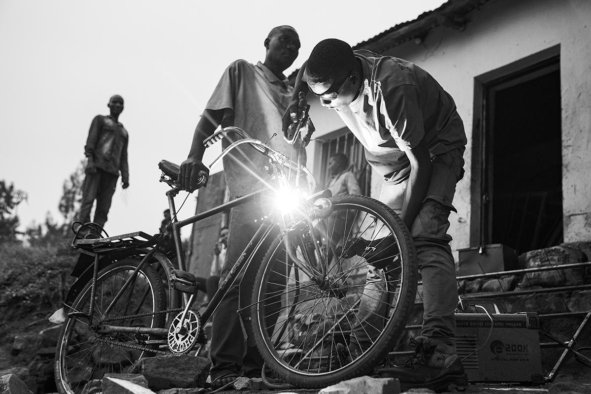 Honorable Mention, Photojournalism (Professional), 2025 “Bike Maintenance – Rwanda-style” © James Busby (United Kingdom)